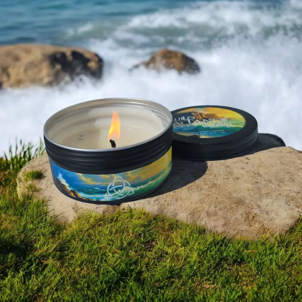 candle beside splashing coastline